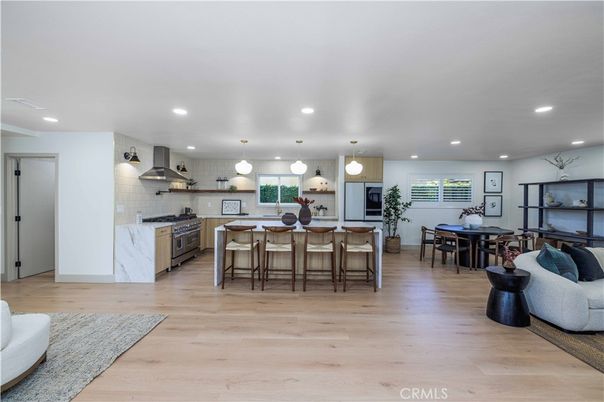 Dining room, Interior, Kitchen, Pendant Lights, Recessed Lighting, Stainless Steel Appliances, Wood Texture Flooring