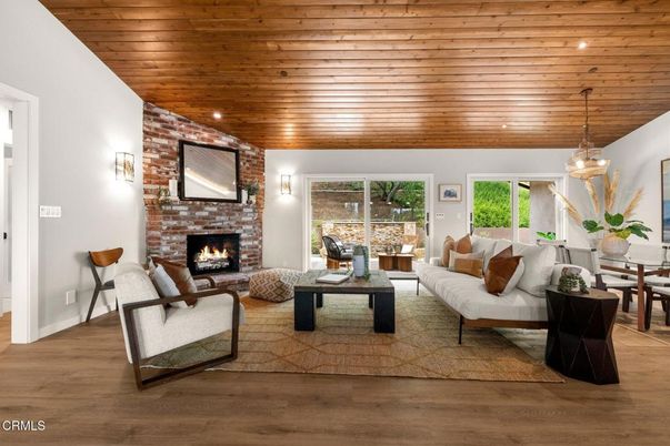 Dining room, Fireplace, Interior, Living room, Pendant Lights, Recessed Lighting, Stone Walls, Wooden Ceilings, Wood Texture Flooring