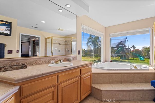 Bathroom, Dual Sink Vanities, Glass Shower, Interior, Recessed Lighting, Tile Countertops