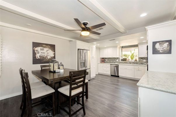 Dining room, Interior, Kitchen, Recessed Lighting, Stainless Steel Appliances, Wood Texture Flooring