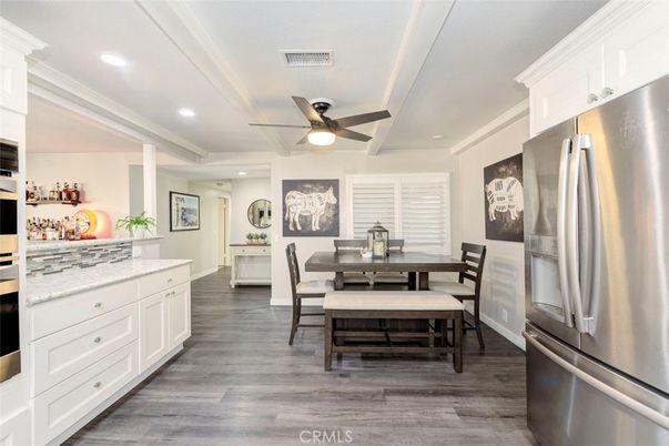 Dining room, Interior, Kitchen, Recessed Lighting, Stainless Steel Appliances, Wood Texture Flooring