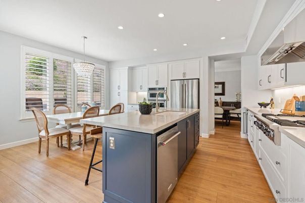 Chandelier, Dining room, Interior, Kitchen, Recessed Lighting, Stainless Steel Appliances, Wood Texture Flooring