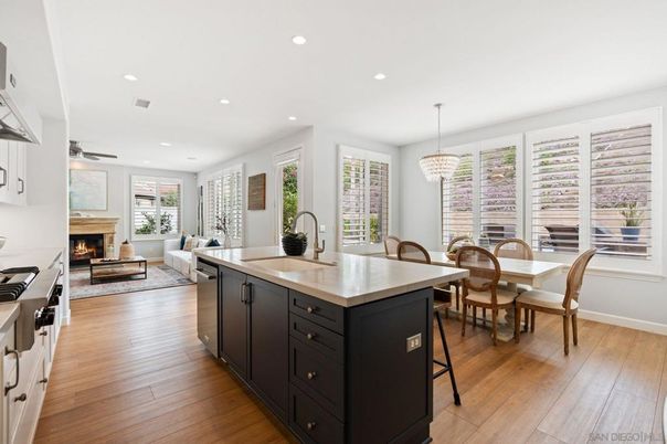 Chandelier, Dining room, Fireplace, Interior, Kitchen, Living room, Recessed Lighting, Wood Texture Flooring