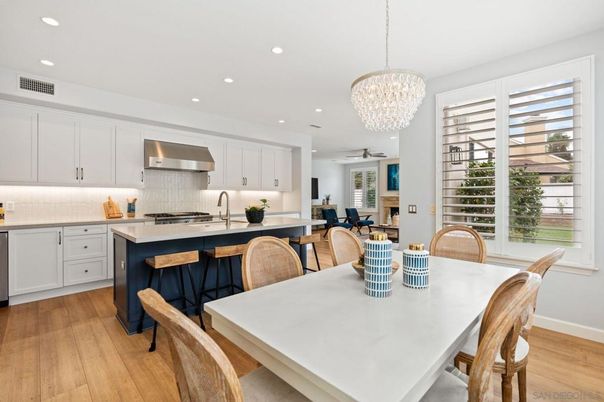 Chandelier, Dining room, Interior, Kitchen, Recessed Lighting, Stainless Steel Appliances, Wood Texture Flooring