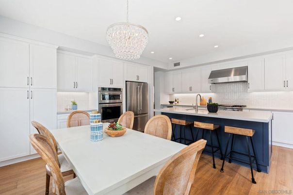 Chandelier, Dining room, Interior, Kitchen, Recessed Lighting, Stainless Steel Appliances, Wood Texture Flooring