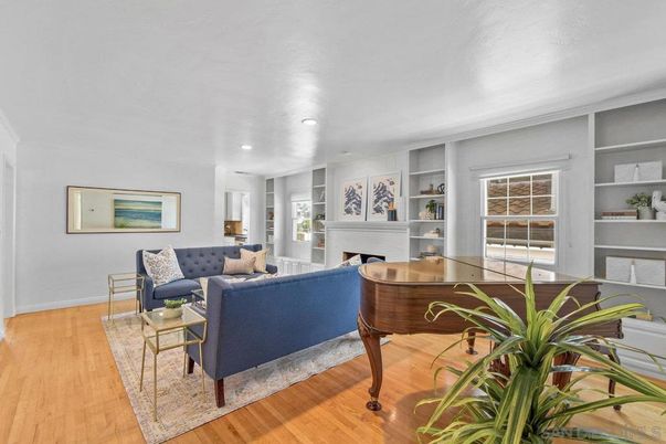 Fireplace, Interior, Living room, Piano, Recessed Lighting, Wood Texture Flooring