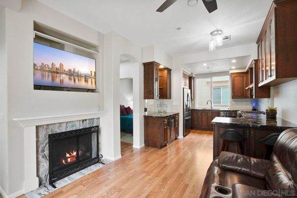 Fireplace, Interior, Kitchen, Living room, Recessed Lighting, Wood Texture Flooring