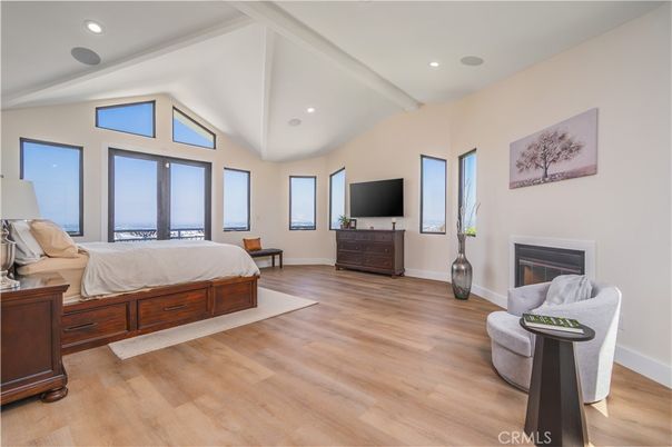 Bedroom, Fireplace, Interior, Recessed Lighting, Wood Texture Flooring