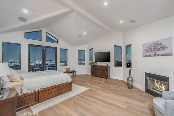 Bedroom, Fireplace, Interior, Recessed Lighting, Wood Texture Flooring