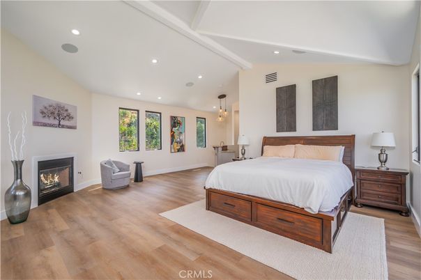 Bedroom, Fireplace, Interior, Pendant Lights, Recessed Lighting, Wood Texture Flooring