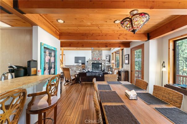 Dining room, Fireplace, Interior, Living room, Recessed Lighting, Wooden Beams, Wooden Ceilings, Wood Texture Flooring