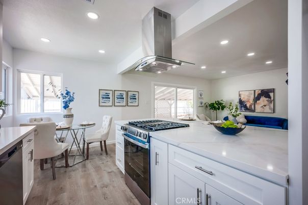 Dining room, Interior, Kitchen, Recessed Lighting, Stainless Steel Appliances, Wood Texture Flooring