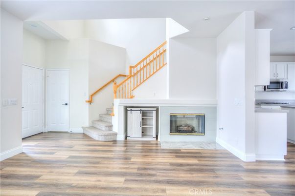 Fireplace, Interior, Kitchen, Recessed Lighting, Wood Texture Flooring