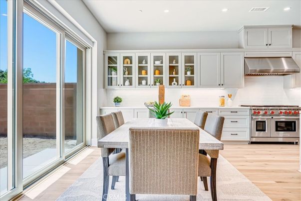 Dining room, Interior, Kitchen, Recessed Lighting, Stainless Steel Appliances, Wood Texture Flooring