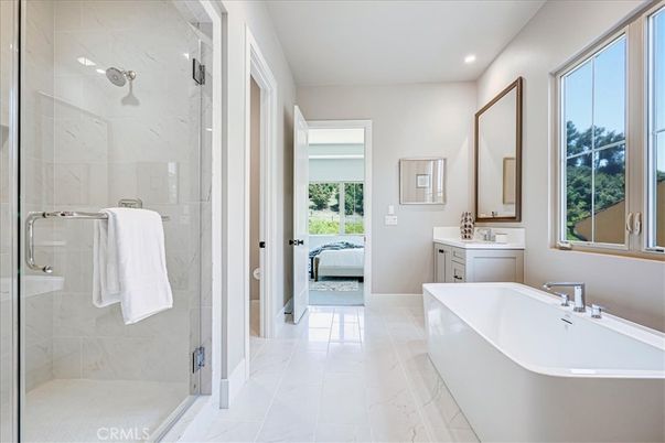 Bathroom, Dual Sink Vanities, Free Standing Baths, Glass Shower, Interior, Marble, Marble Walls, Recessed Lighting