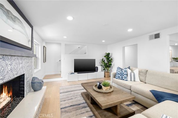 Fireplace, Interior, Living room, Recessed Lighting, Wood Texture Flooring