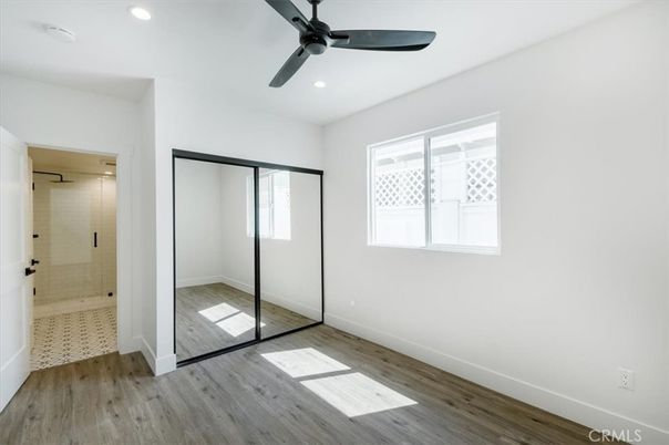 Bathroom, Empty room, Glass Shower, Interior, Recessed Lighting, Wood Texture Flooring