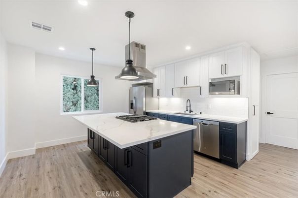 Interior, Kitchen, Pendant Lights, Recessed Lighting, Stainless Steel Appliances, Wood Texture Flooring