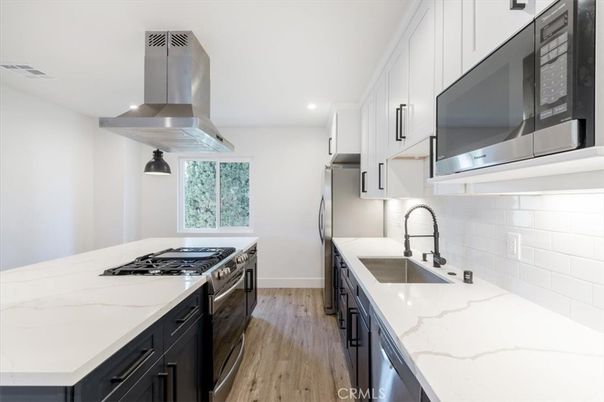 Interior, Kitchen, Pendant Lights, Recessed Lighting, Stainless Steel Appliances, Wood Texture Flooring