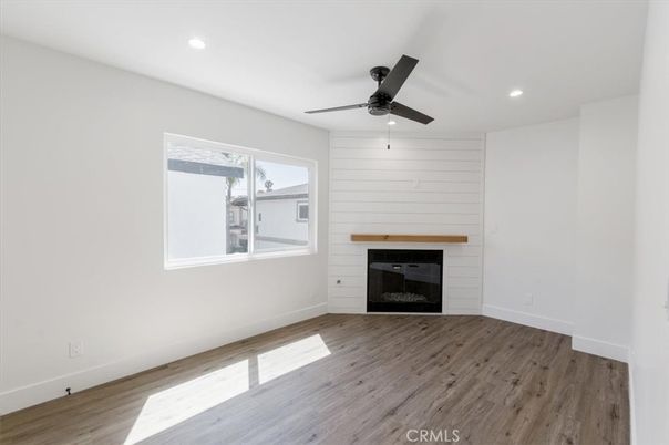 Empty room, Fireplace, Interior, Recessed Lighting, Wood Texture Flooring