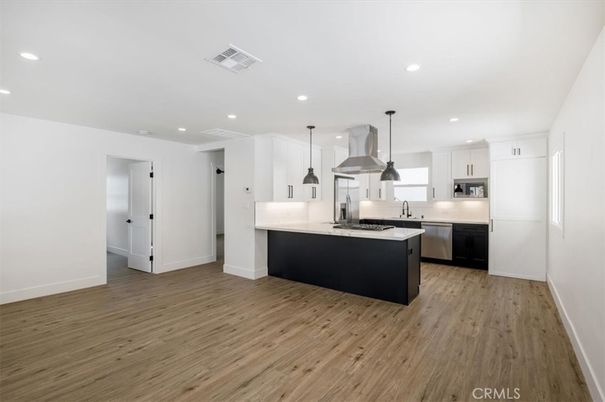 Interior, Kitchen, Pendant Lights, Recessed Lighting, Stainless Steel Appliances, Wood Texture Flooring