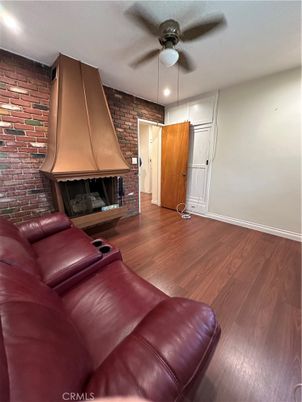 Home Theatre Room, Fireplace, Interior, Stone Walls, Wood Texture Flooring