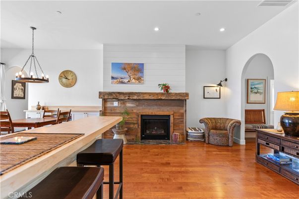 Dining room, Fireplace, Interior, Pendant Lights, Recessed Lighting, Wood Texture Flooring