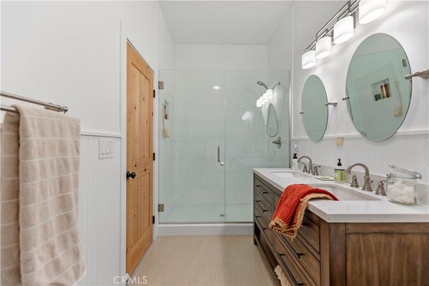 Bathroom, Dual Sink Vanities, Glass Shower, Interior, Wood Texture Flooring