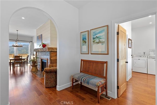 Dining room, Fireplace, Interior, Pendant Lights, Recessed Lighting, Washer, Wood Texture Flooring