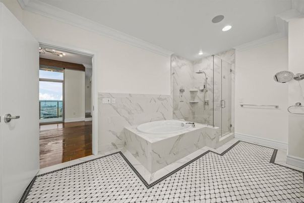 Bathroom, Glass Shower, Interior, Marble Walls, Recessed Lighting, Wood Texture Flooring