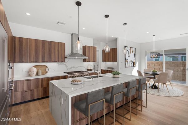 Dining room, Interior, Kitchen, Pendant Lights, Recessed Lighting, Stainless Steel Appliances, Wood Texture Flooring