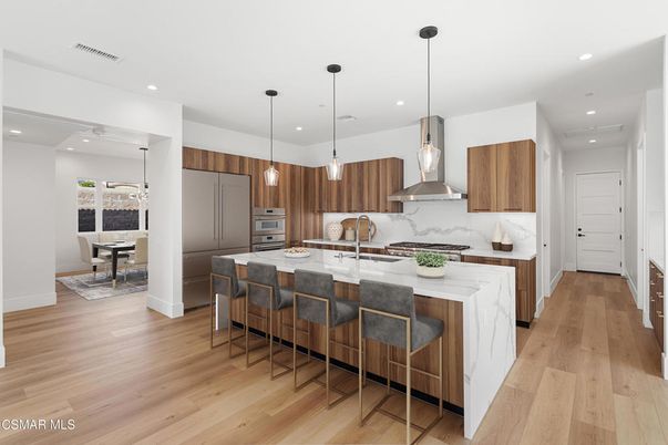 Dining room, Interior, Kitchen, Pendant Lights, Recessed Lighting, Stainless Steel Appliances, Wood Texture Flooring