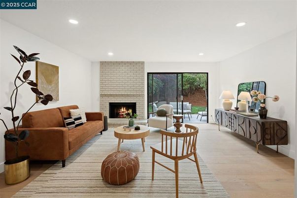Fireplace, Interior, Living room, Recessed Lighting, Stone Walls, Wood Texture Flooring