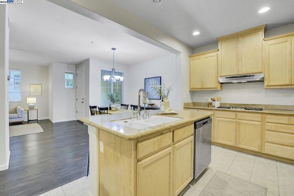 Chandelier, Dining room, Interior, Kitchen, Living room, Pendant Lights, Recessed Lighting, Wood Texture Flooring