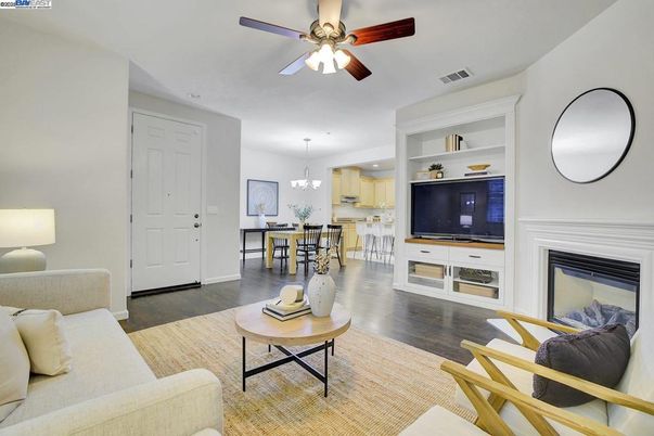 Chandelier, Dining room, Fireplace, Interior, Kitchen, Living room, Pendant Lights, Recessed Lighting, Wood Texture Flooring