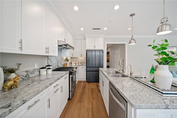 Interior, Kitchen, Pendant Lights, Recessed Lighting, Stainless Steel Appliances, Wood Texture Flooring