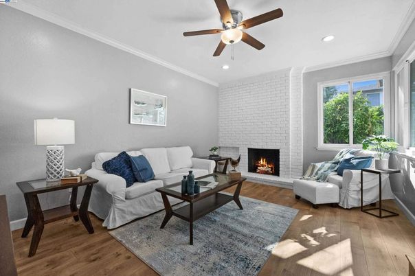 Fireplace, Interior, Living room, Recessed Lighting, Stone Walls, Wood Texture Flooring