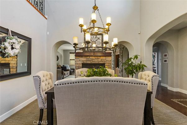 Chandelier, Dining room, Fireplace, Interior, Wood Texture Flooring