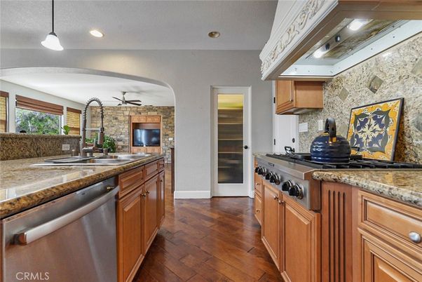 Interior, Kitchen, Pendant Lights, Recessed Lighting, Stainless Steel Appliances, Stone Walls, Wood Texture Flooring