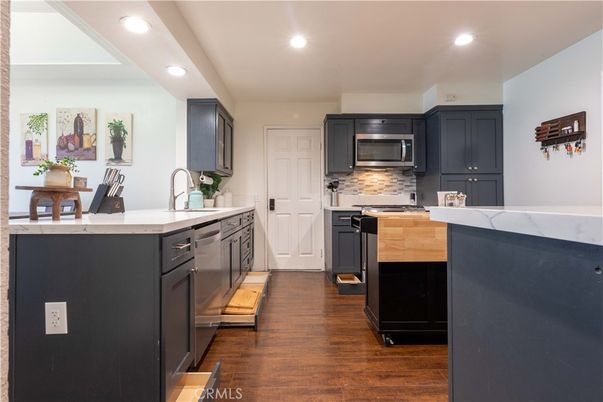 Interior, Kitchen, Recessed Lighting, Stainless Steel Appliances, Wood Texture Flooring