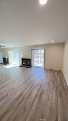 Empty room, Fireplace, Interior, Recessed Lighting, Wood Texture Flooring