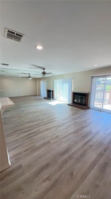 Empty room, Fireplace, Interior, Recessed Lighting, Wood Texture Flooring
