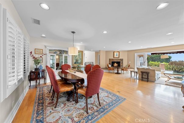 Dining room, Fireplace, Interior, Living room, Pendant Lights, Recessed Lighting, Wood Texture Flooring