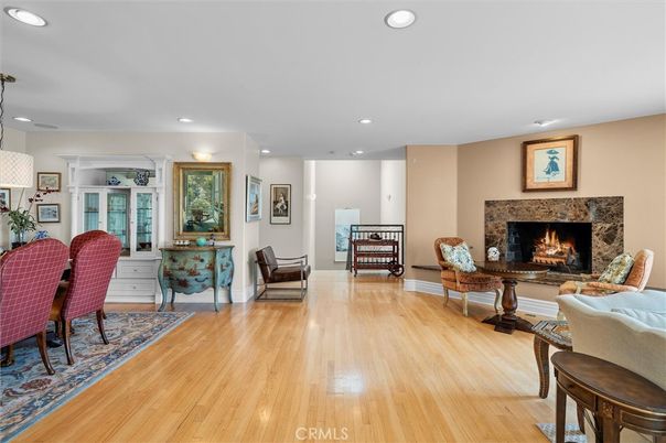 Dining room, Fireplace, Interior, Living room, Recessed Lighting, Wood Texture Flooring