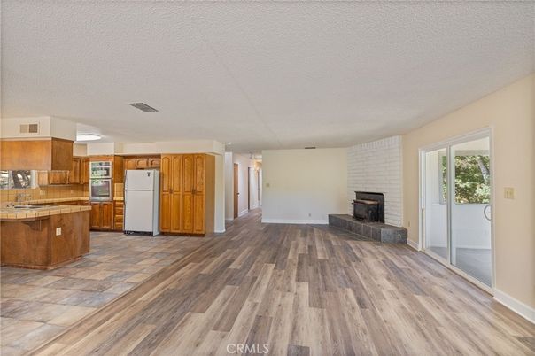 Empty room, Fireplace, Interior, Kitchen, Wood Texture Flooring