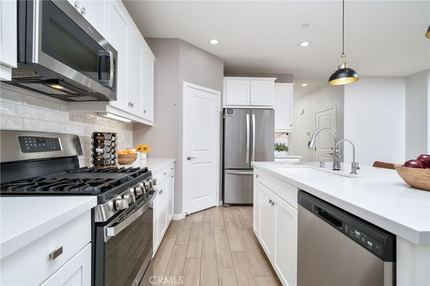 Interior, Kitchen, Pendant Lights, Recessed Lighting, Stainless Steel Appliances, Wood Texture Flooring