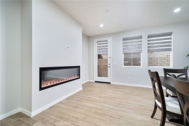 Dining room, Fireplace, Interior, Recessed Lighting, Wood Texture Flooring
