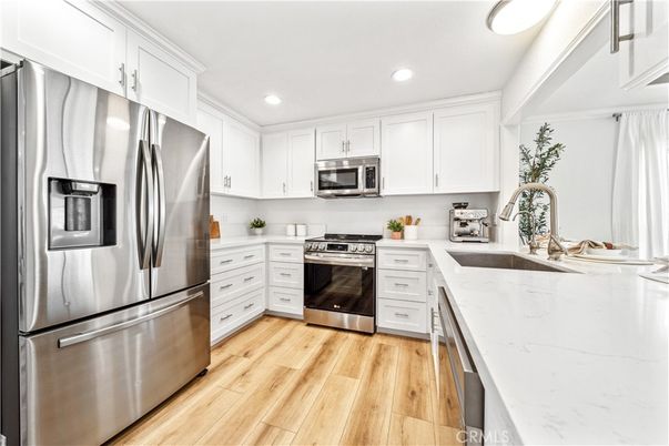 Interior, Kitchen, Recessed Lighting, Stainless Steel Appliances, Wood Texture Flooring