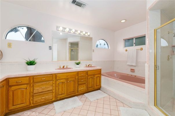 Bathroom, Dual Sink Vanities, Glass Shower, Interior, Recessed Lighting, Tile Countertops