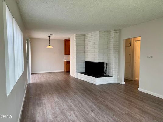 Empty room, Fireplace, Interior, Pendant Lights, Wood Texture Flooring